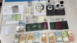 كان متجر الهواتف المحمولة في أومونيا بمثابة "واجهة" لتهريب وثائق السفر المزورة و قد تم القبض على شخصين